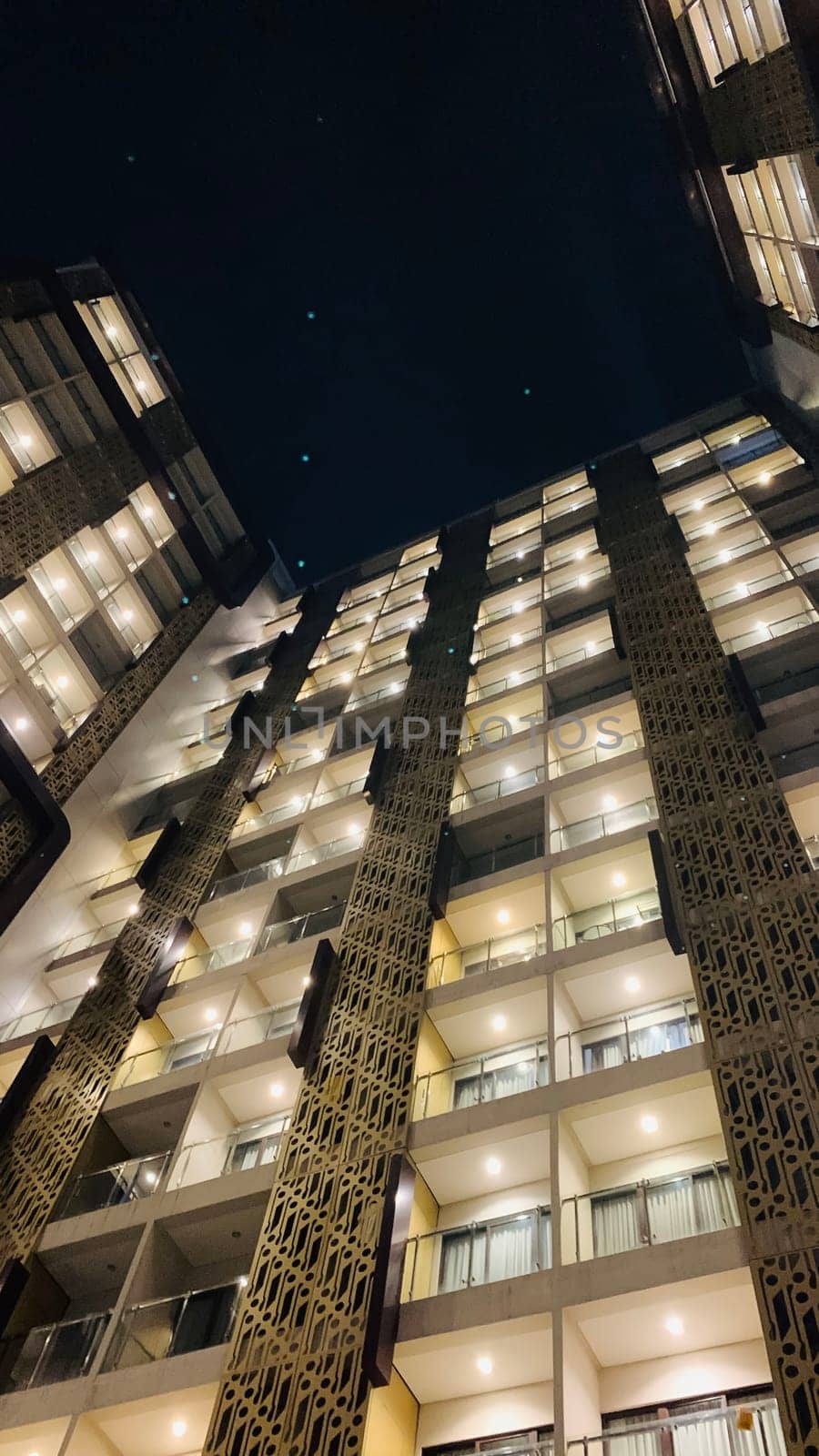 Tall building perspective during night time, business background, business template background, presentation background for your creative content creation