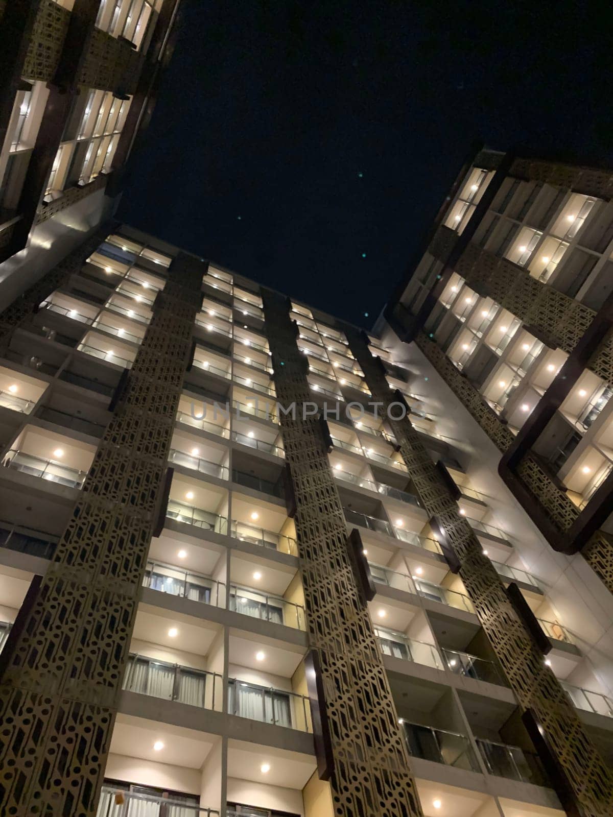 Tall building perspective during night time, business background, business template background, presentation background for your creative content creation
