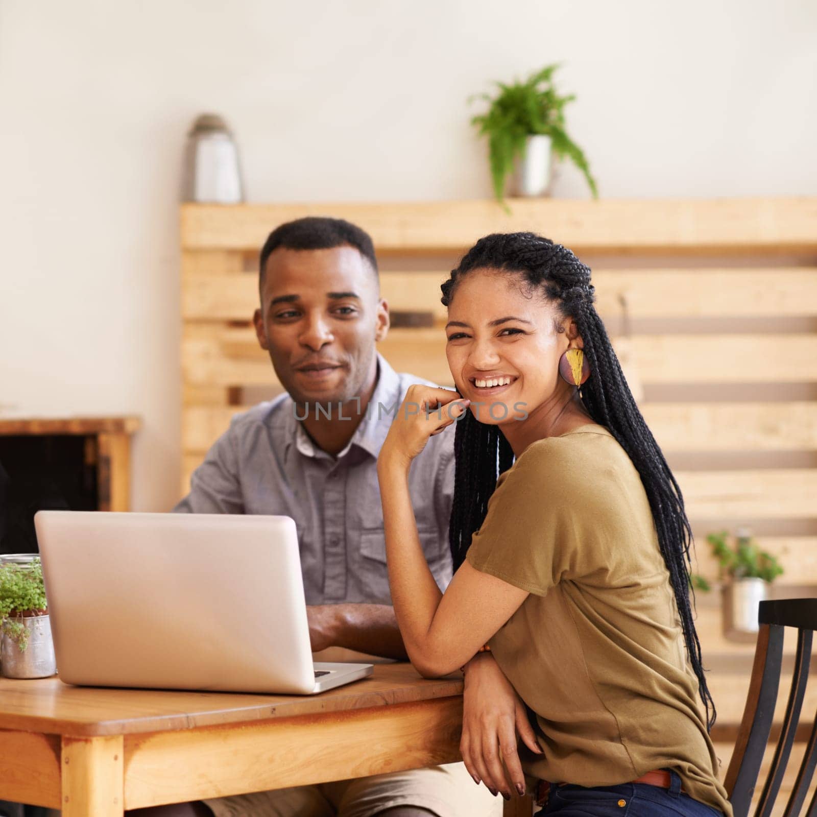 Woman, man and teamwork with laptop in coffee shop for startup or research, project planning or collaboration. Friends, smile and internet in cafe with digital connectivity, proposal or remote work.