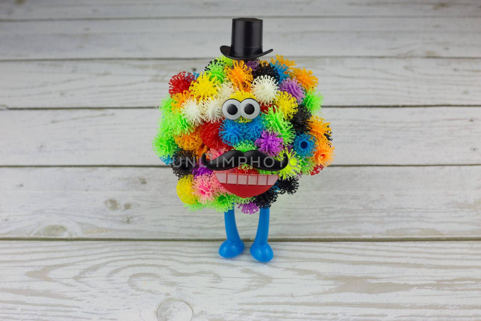 Ball monster made from velcro construction set, colored balls with hooks for creating characters, modern toy