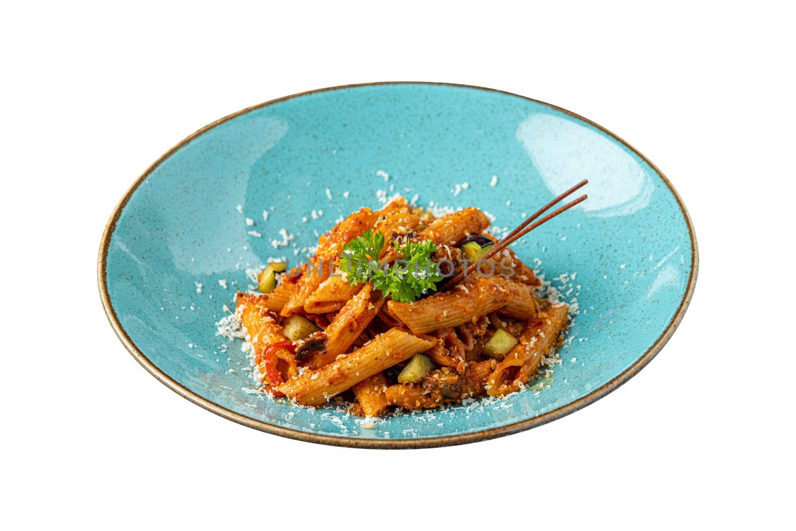 Penne pasta in tomato sauce, tomatoes decorated with parsley on a white background