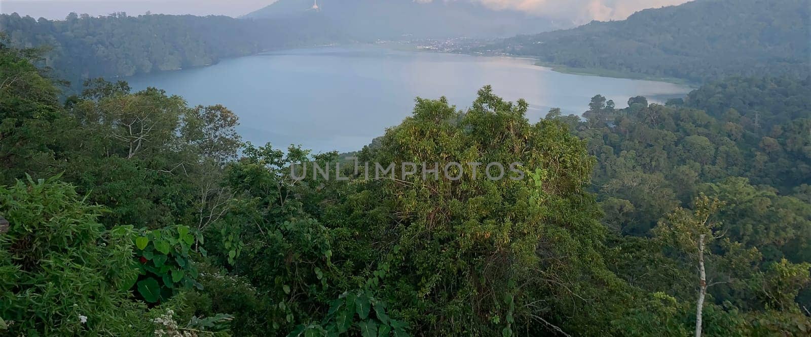 beautiful panorama of beautiful countryside of twin lake in bali. sunny afternoon. wonderful springtime landscape in mountains by antoksena