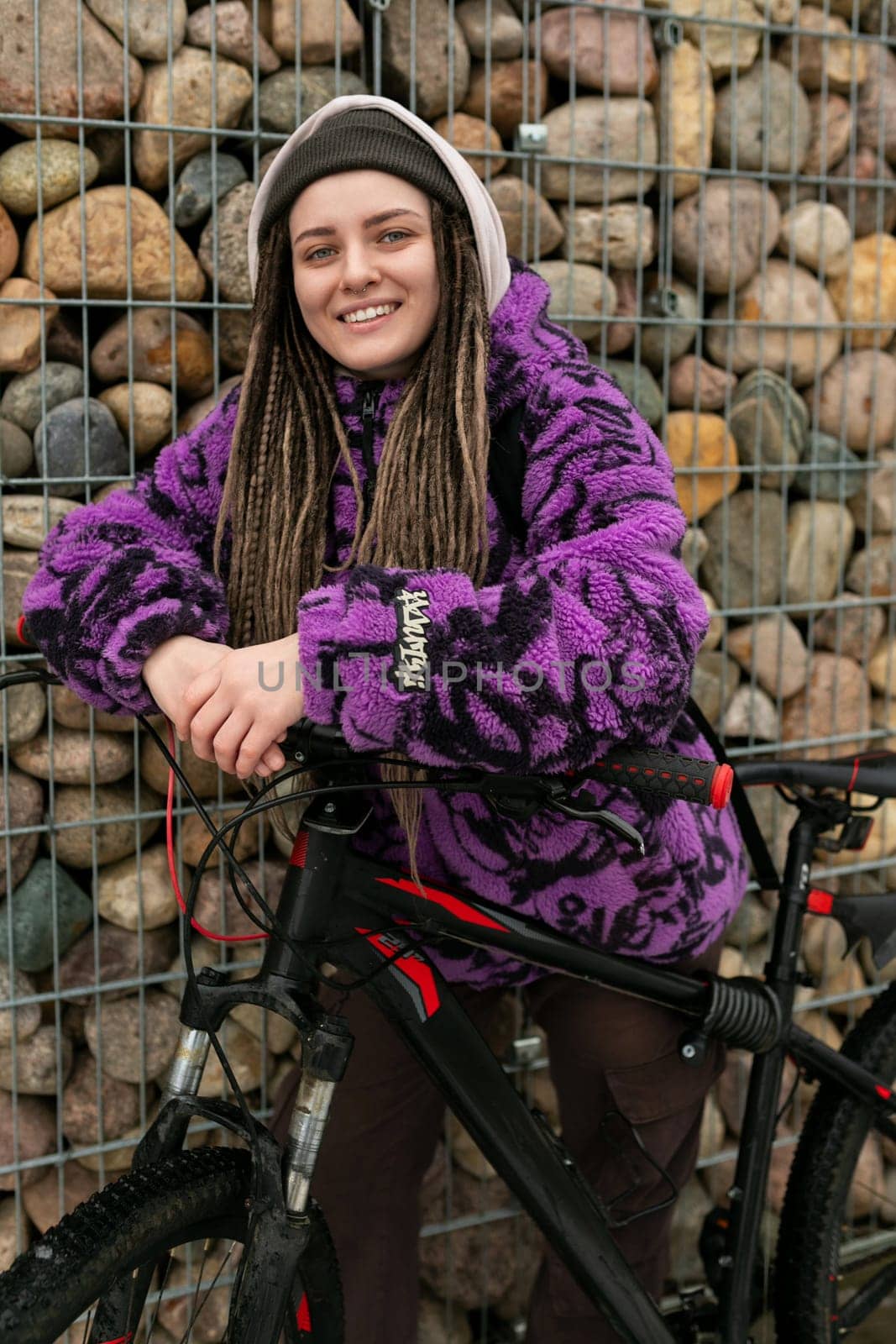 European stylish woman riding a sports bike around the city.