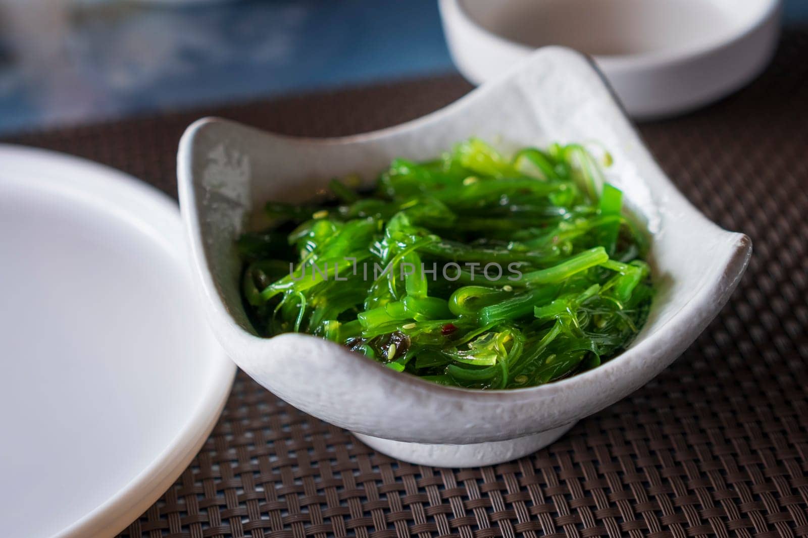 A bowl of Wakame seaweed salad by Robertobinetti70