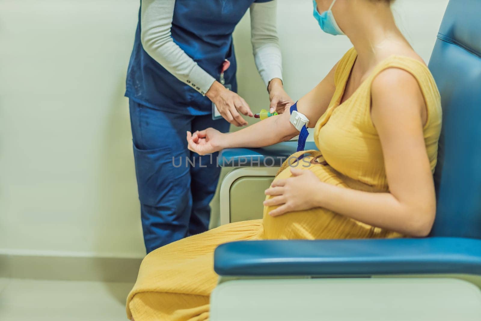 pregnant woman undergoes a blood test, a pivotal step in ensuring the well-being of both herself and her developing baby during the maternity journey by galitskaya