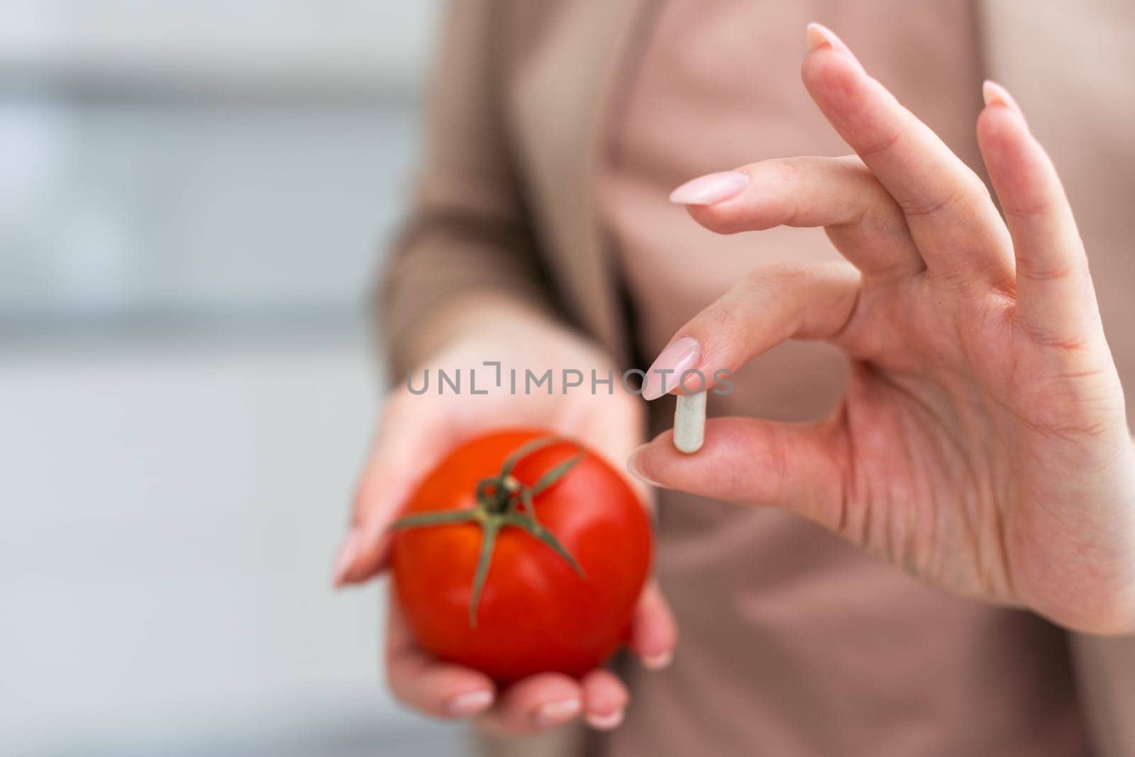 woman showing fresh tomatoes from organic farming. High quality photo