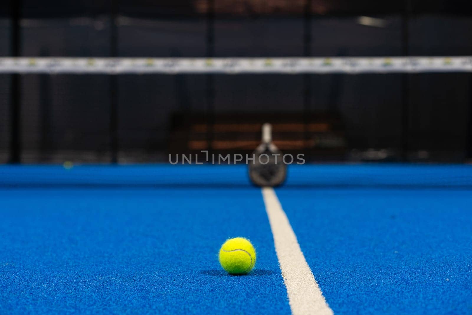 paddle sport on the paddle court, ball, rackets. High quality photo