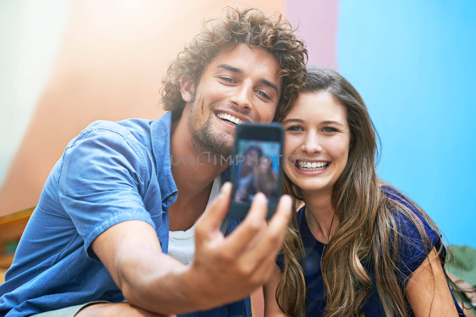 Couple, selfie and smiling with sunshine for picture, happy and post for social media on summer vacation. Man, woman and together for love on holiday with romance and commitment for memories.