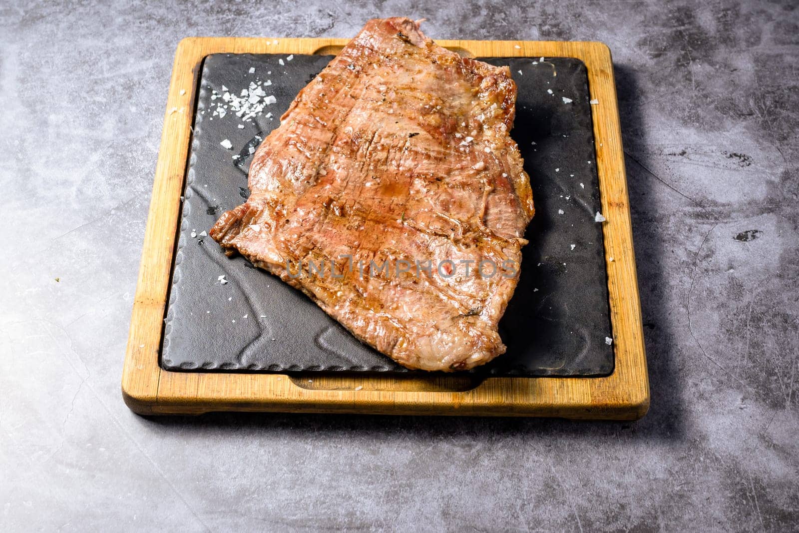Beef ribs on wood board,
