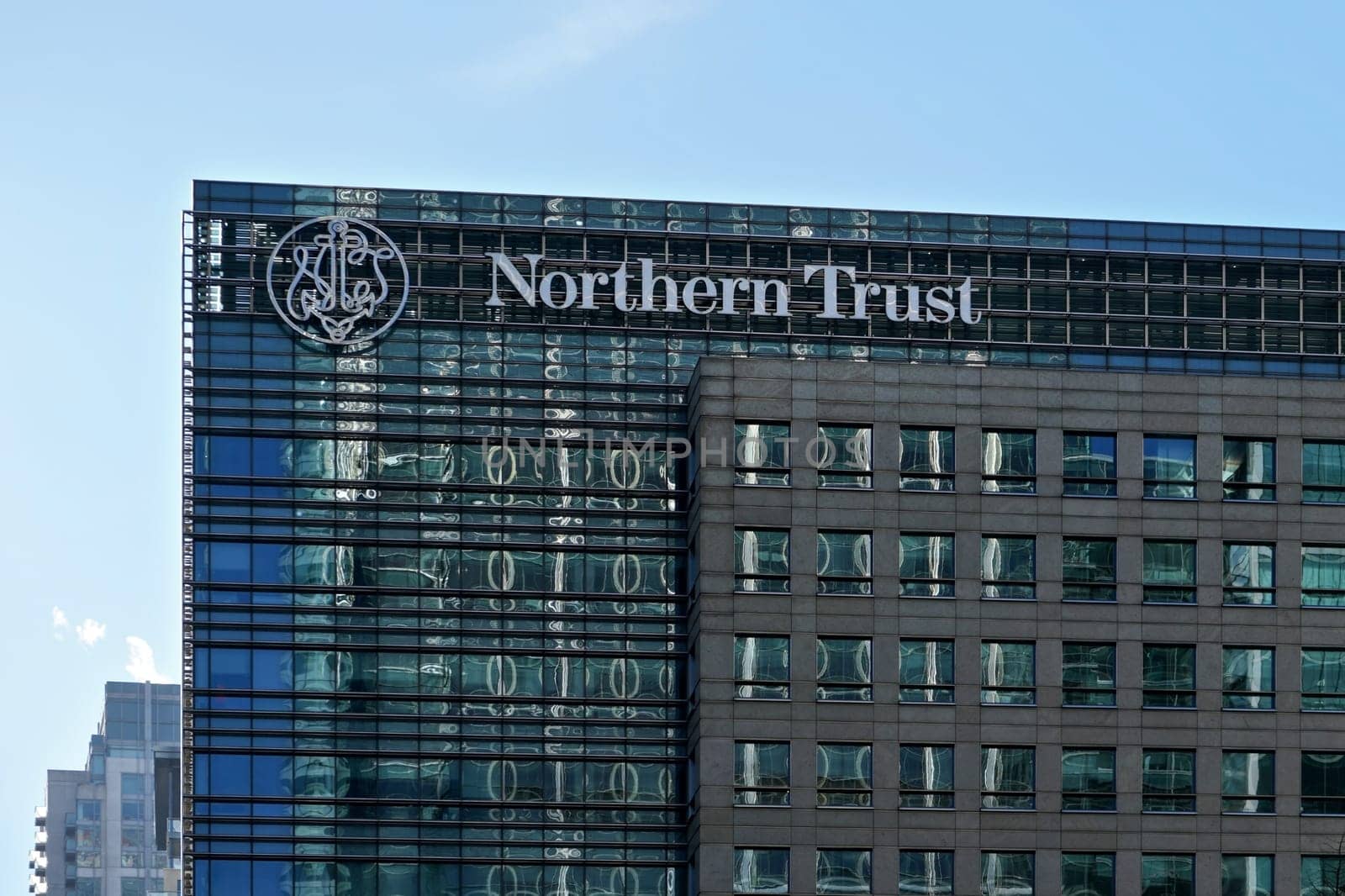London, United Kingdom - February 03, 2019: Northern Trust UK branch offices at Canary Wharf. NT corporation is financial services company founded in 1889