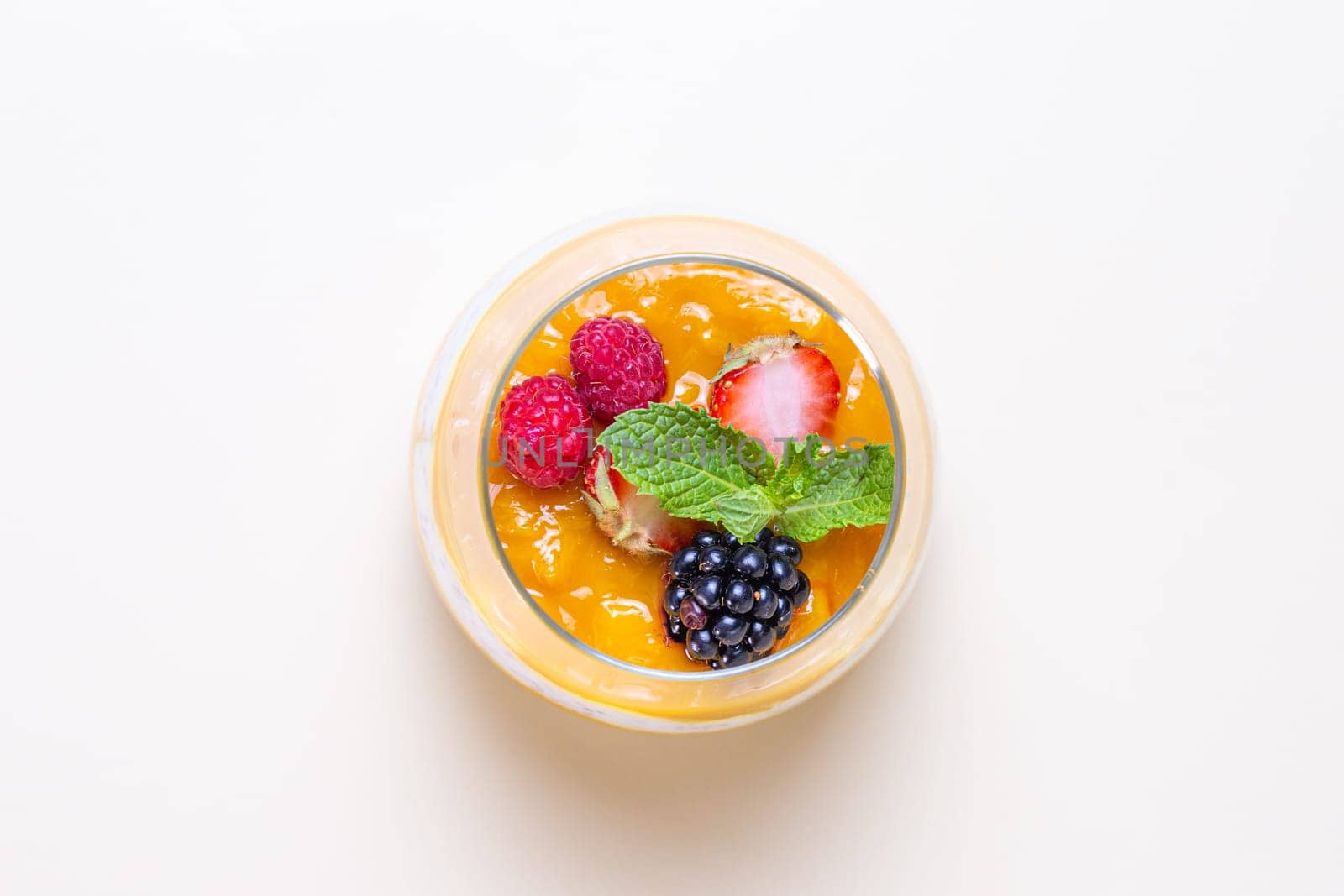 Top view Chia seed pudding with fresh berries and mint by Pukhovskiy