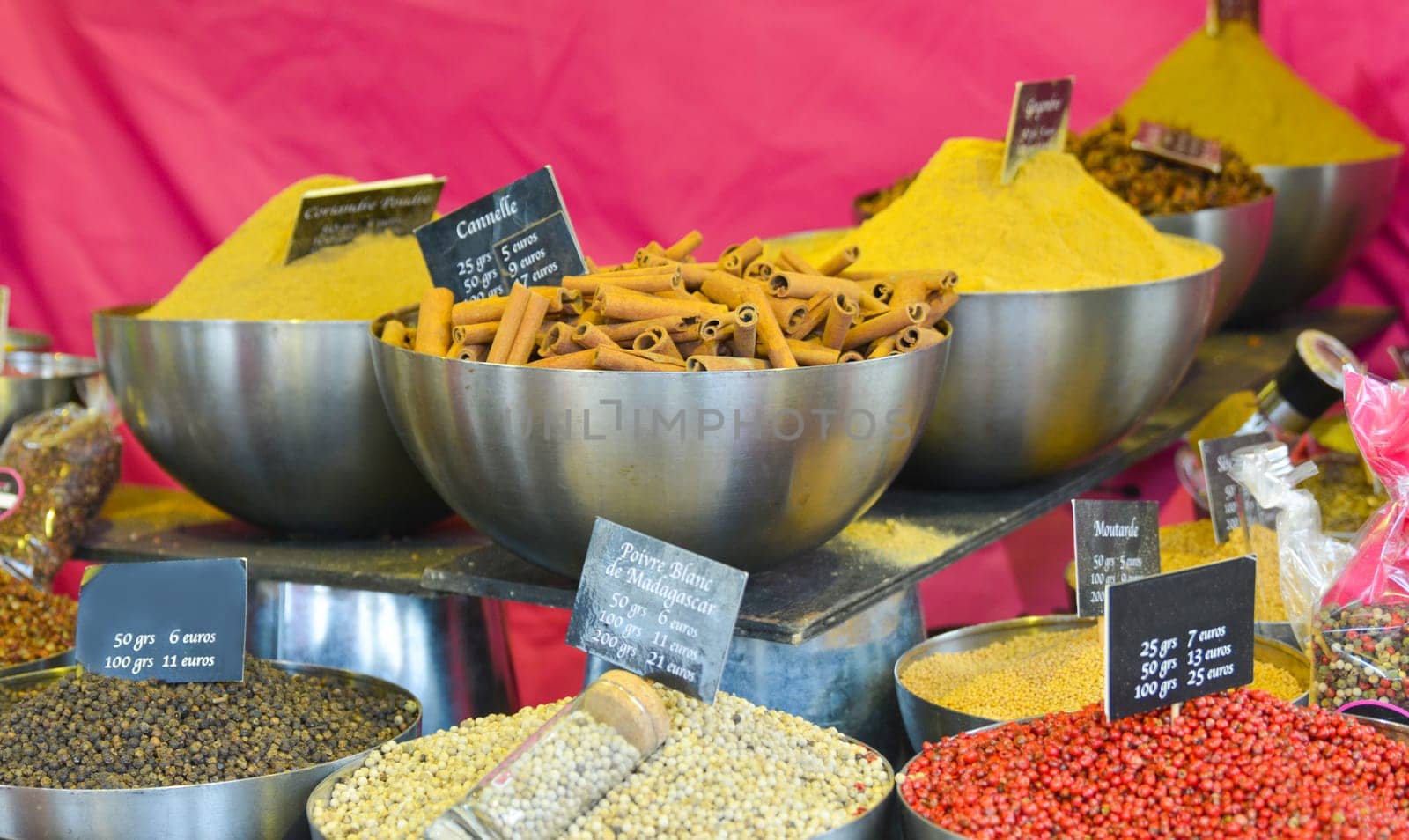 Variety of spices on the market by Godi