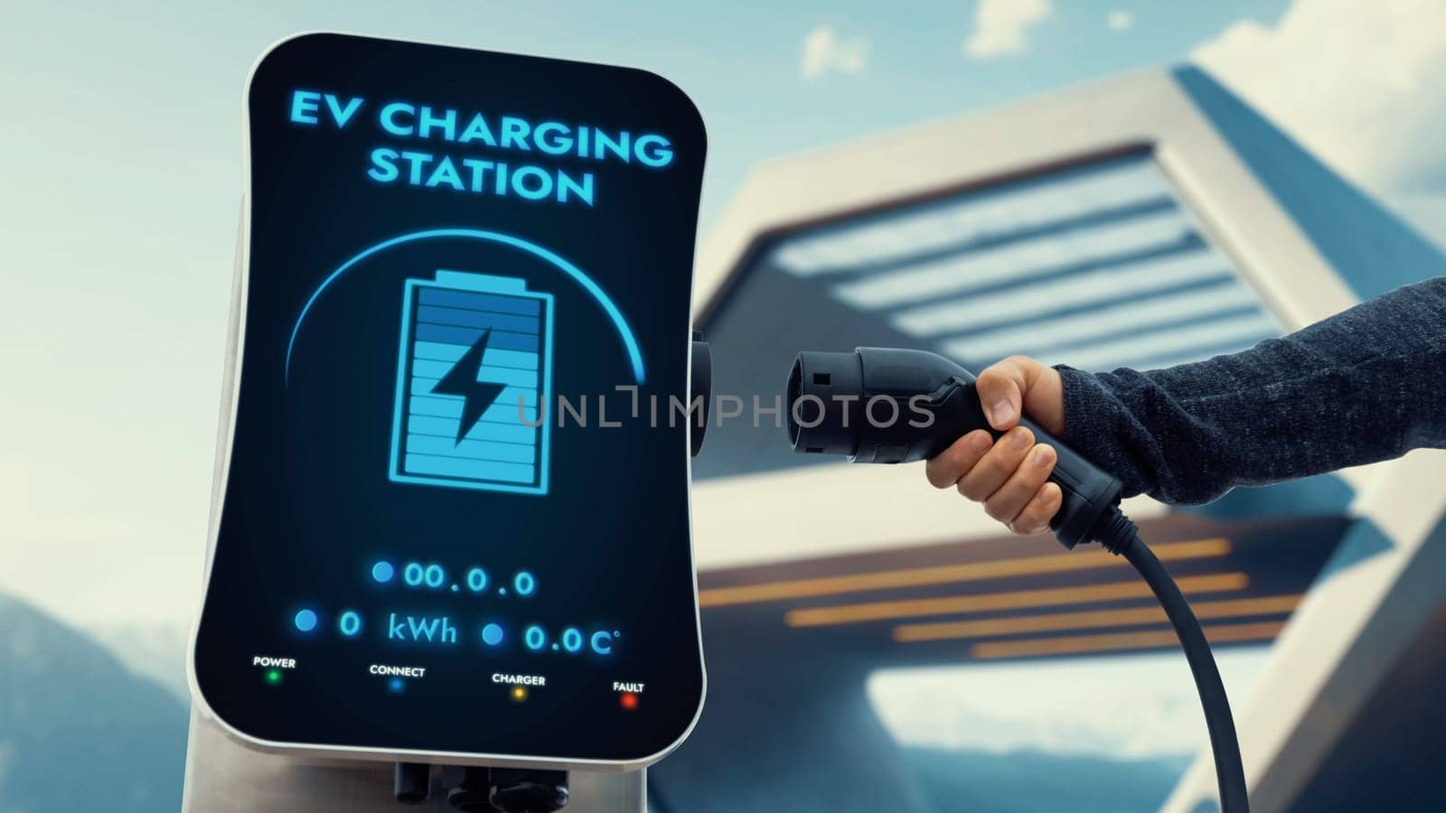Businessman pull and hold EV charger form electric car charging station. Peruse by biancoblue