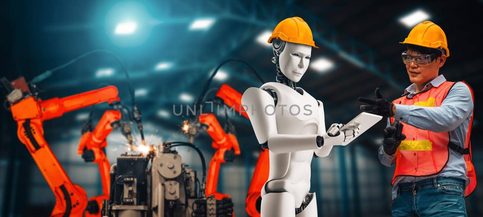 XAI Mechanized industry robot and human worker working together in future factory. Concept of artificial intelligence for industrial revolution and automation manufacturing process.