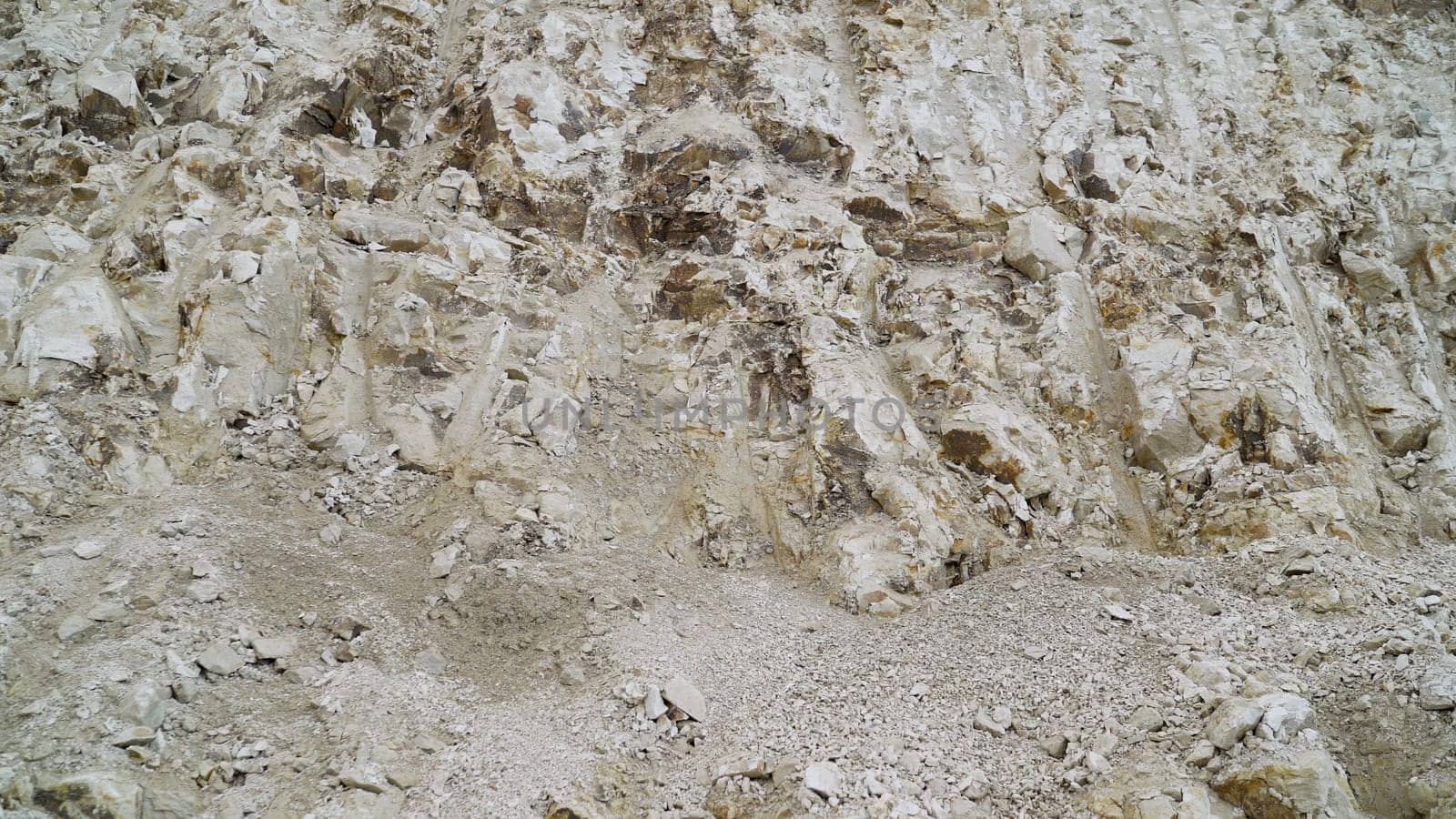 Stone texture background. Mining, limestone. Lime quarry, close-up. by Rusrussid