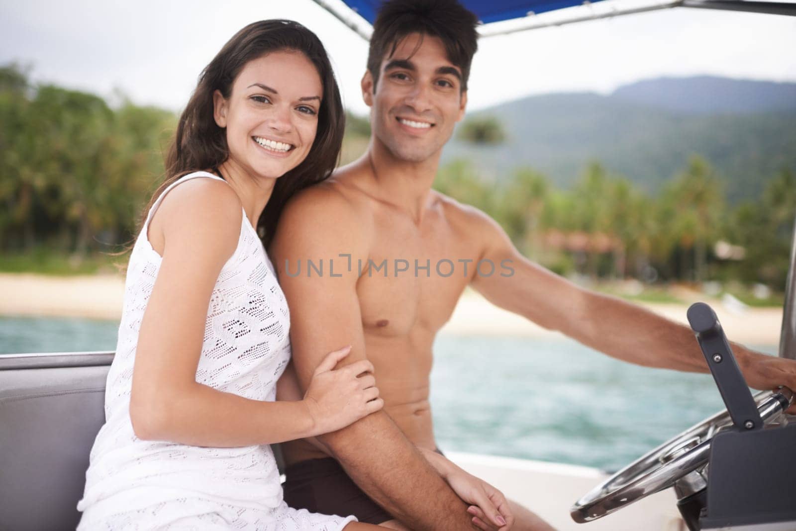 Couple, portrait and driving boat on ocean holiday or explore sea on vacation adventure, travel or steering wheel. Man, woman and happy in Hawaii or outdoor journey or coast, transportation or nature.