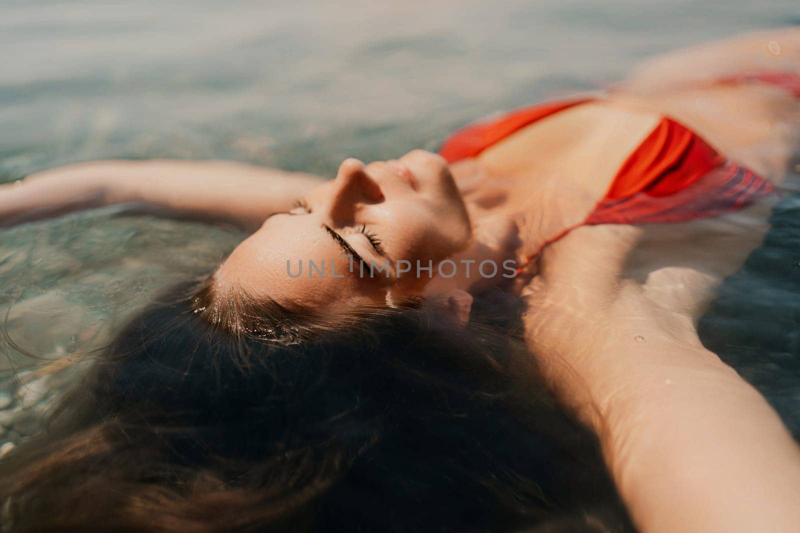 Happy woman sea relaxing floating in transparent sea water on summer holiday. Travel leisure recreation lifestyle, female in nature. by Matiunina