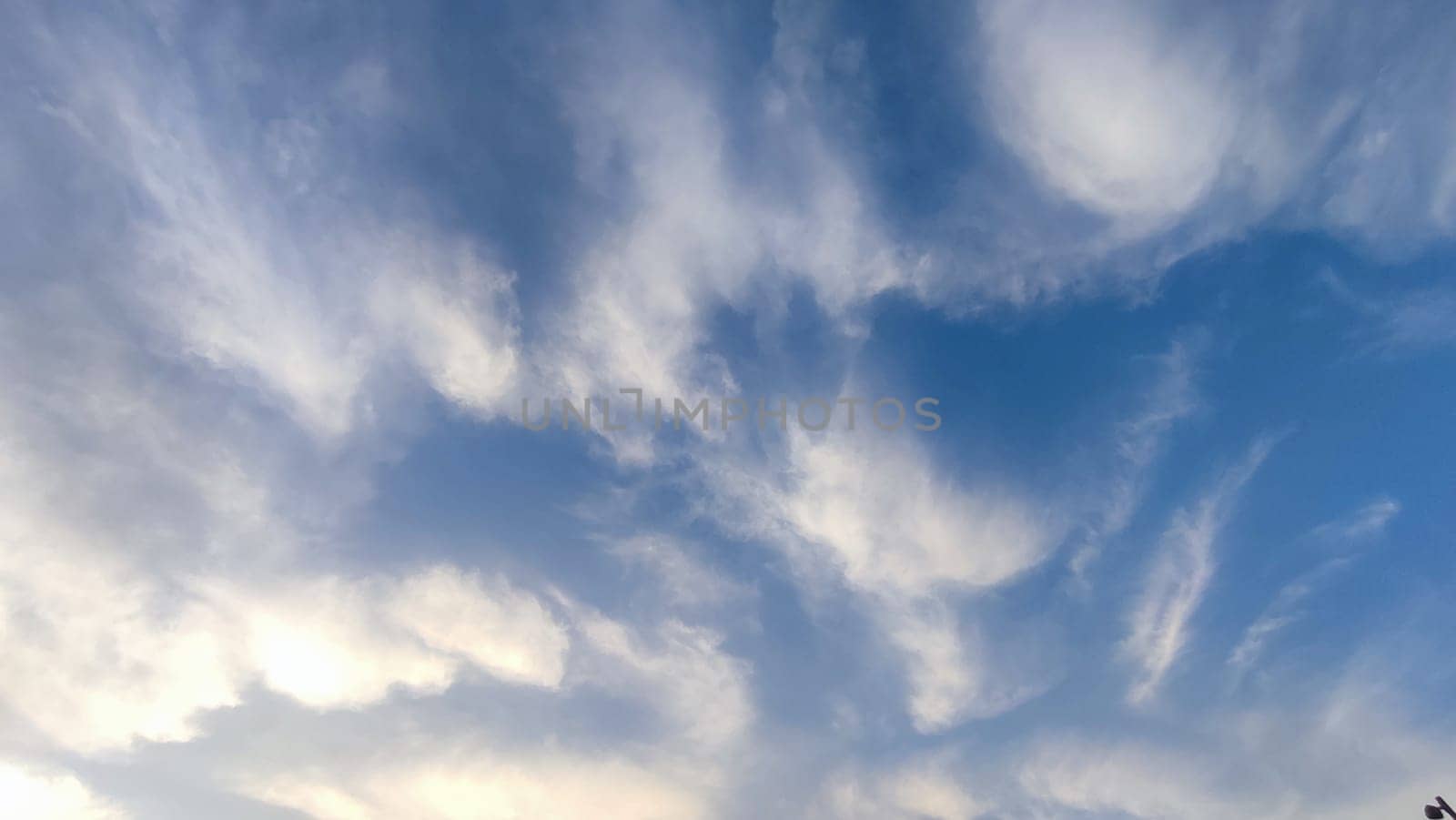 Blue light sky nature white clouds whether background . High quality photo