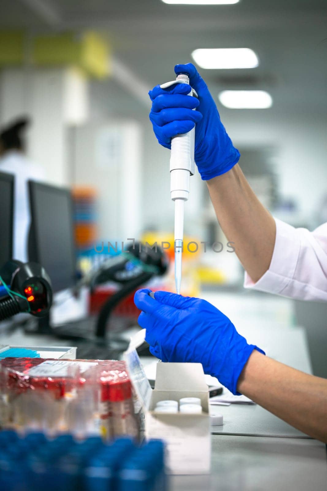 process of working with analyses in the laboratory. hands close-up.