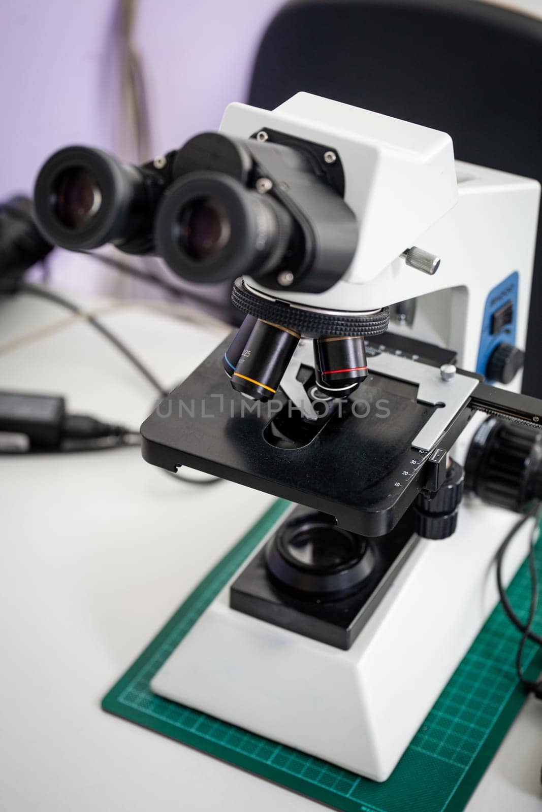 Microscope on the table in the laboratory, the technology of scientific research.