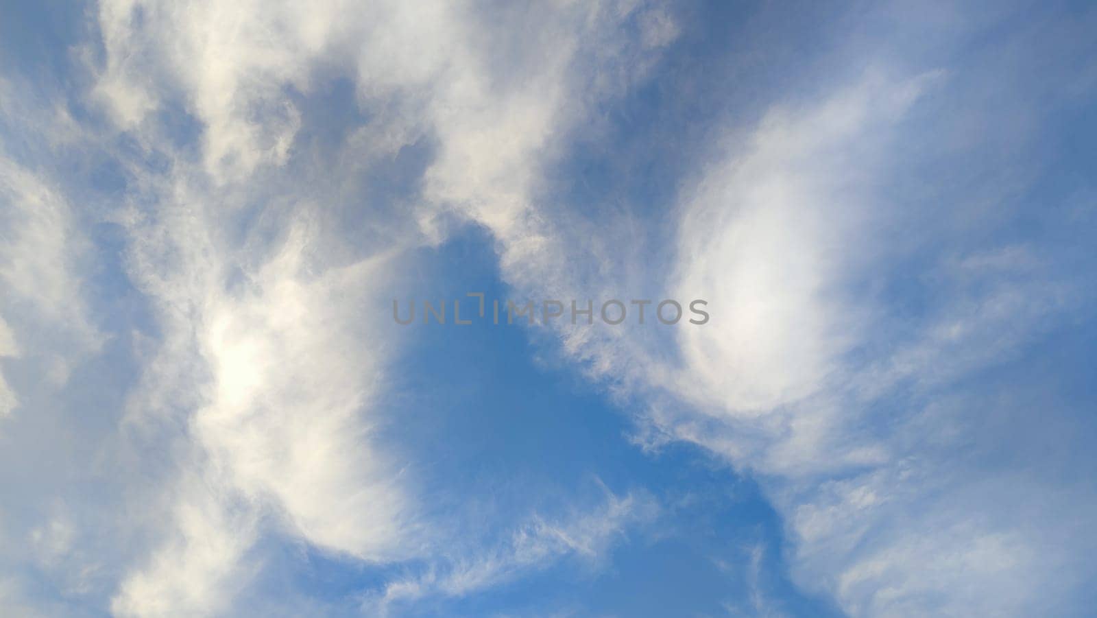 Blue light sky nature white clouds whether background . High quality photo