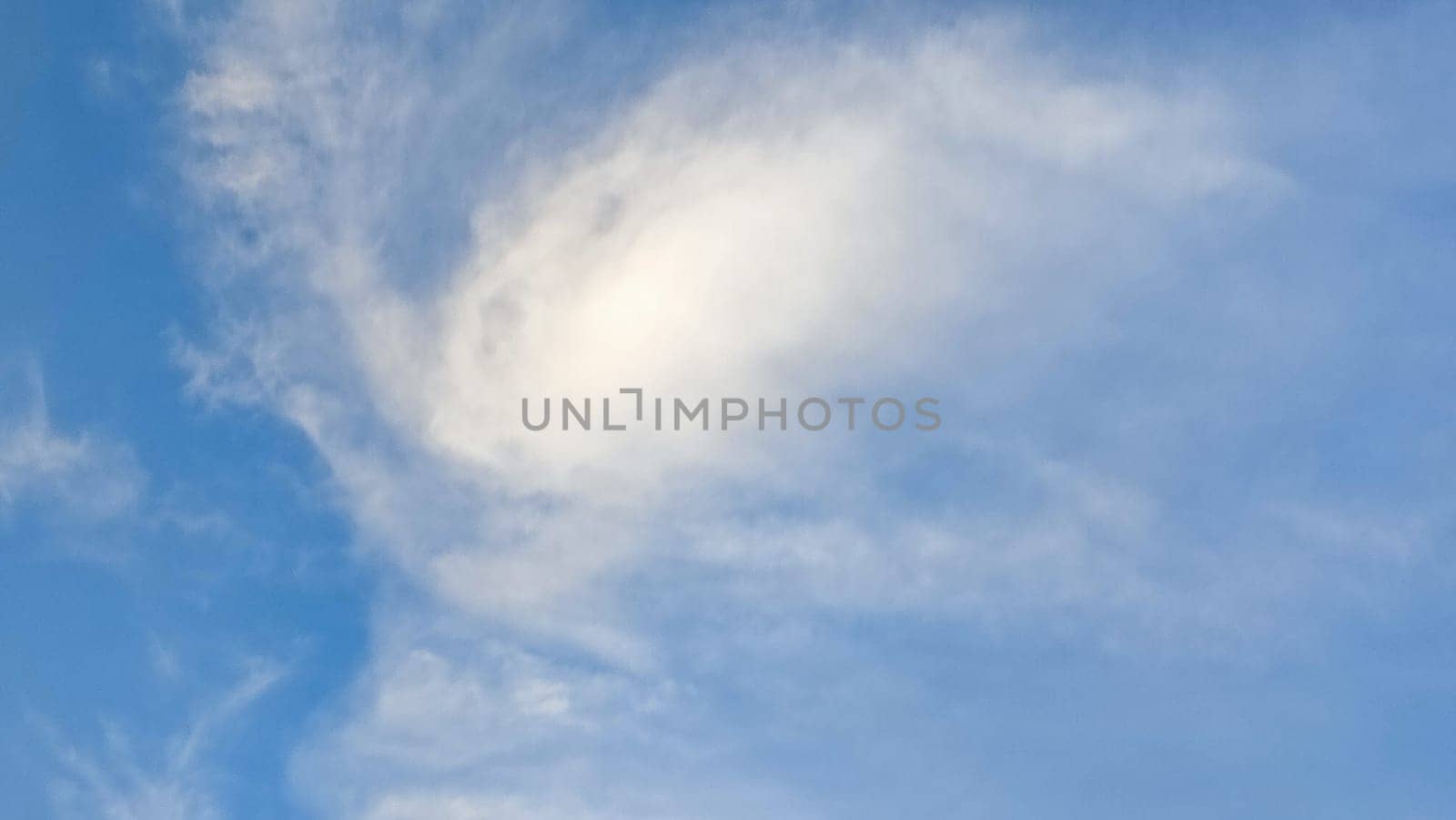 Blue light sky nature white clouds whether background . High quality photo