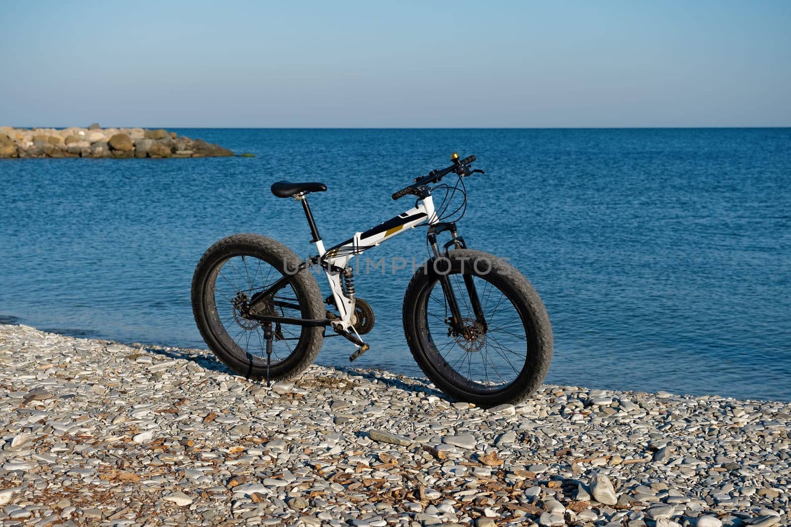 Parked on the beach bike waiting for the continuation by NataliPopova