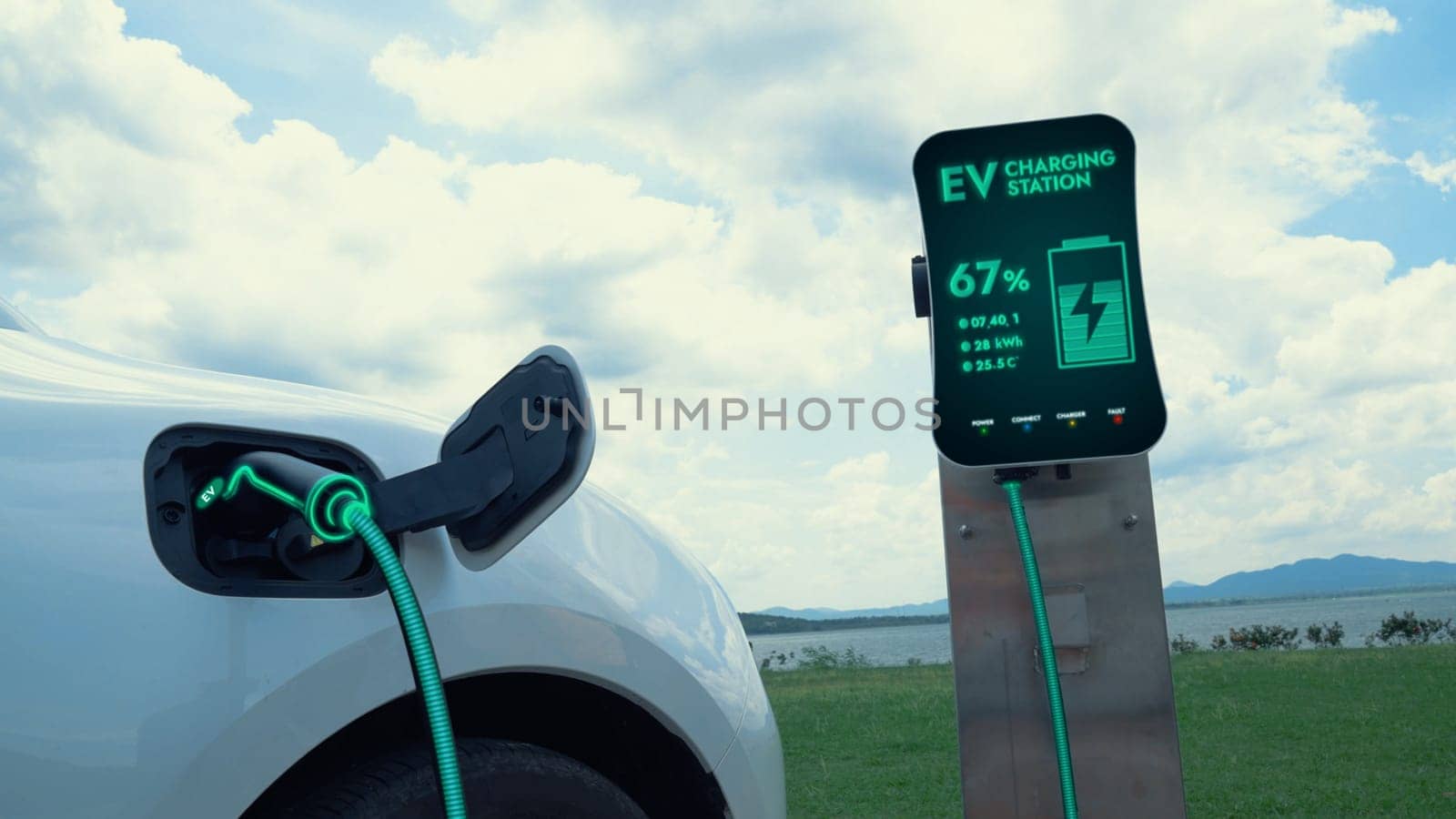 Electric car plugged in with charging station to recharge battery by EV charger cable with nature and lake background. Future innovative ev car and energy sustainability. Peruse