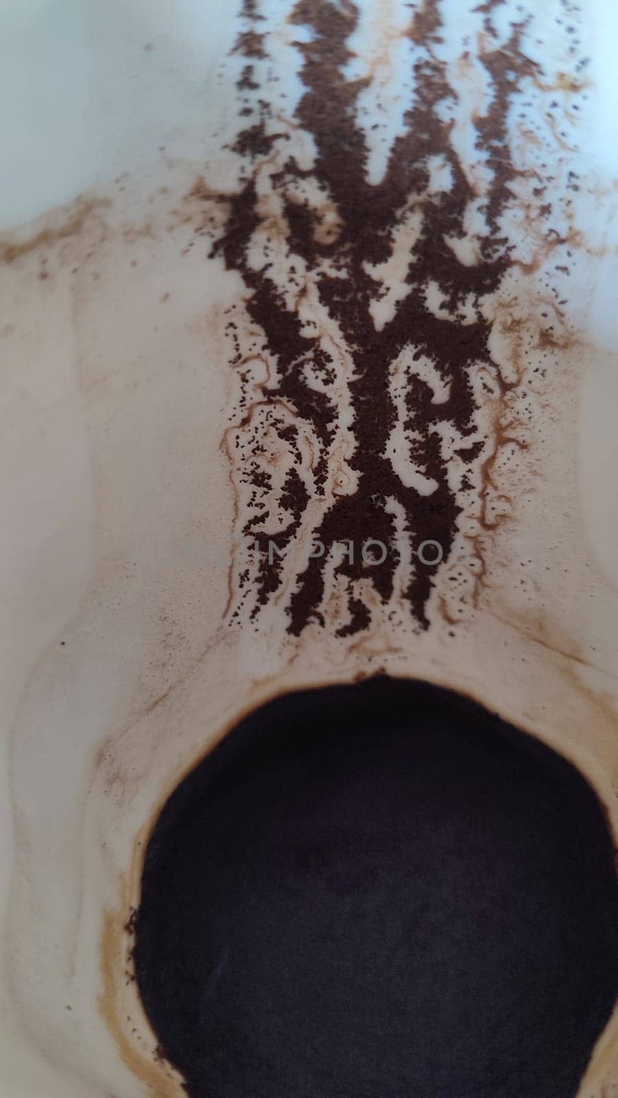 coffee grounds stain in white cup. High quality photo