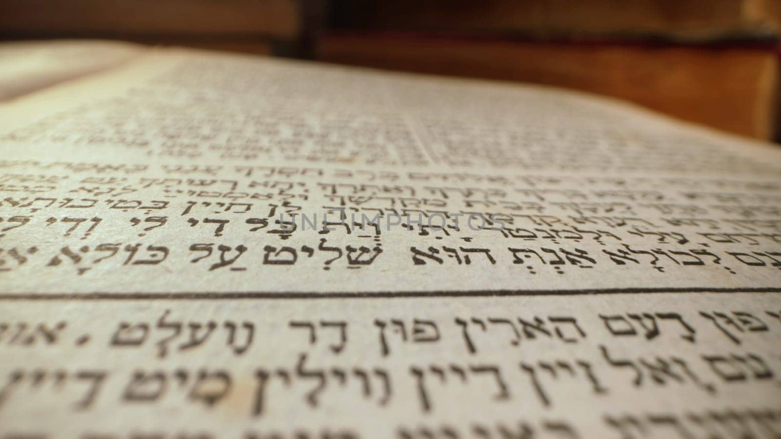 Exploring sacred jewish heritage scriptures on hebrew. Details of the Torah. Tradition and wisdom, macro footage. Letters and symbols. by kristina_kokhanova