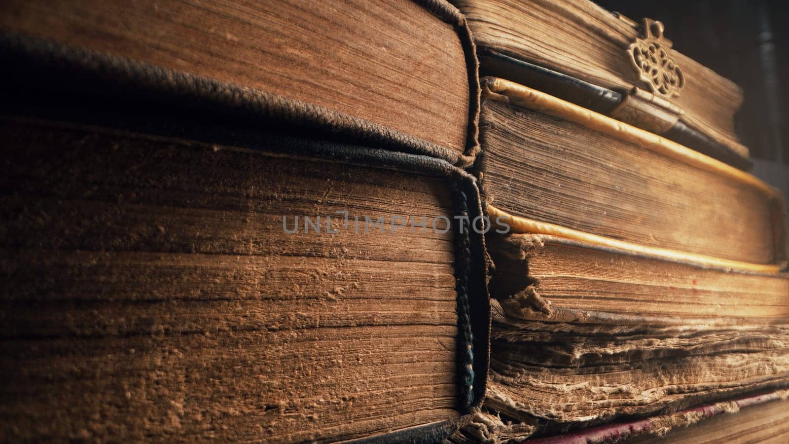 Old books in antique shop or abandoned library. Macro footage. Bookstore in vintage style. Literature, knowledge, information concept. by kristina_kokhanova