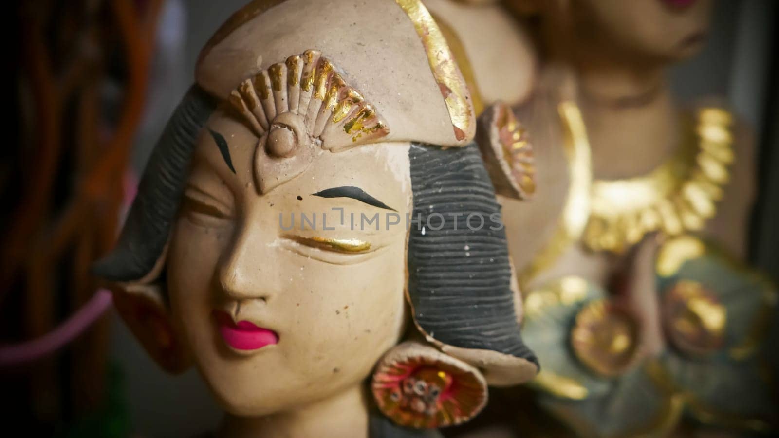 Beautiful artistic statue of a Balinese or javanese dancer used as garden decoration, javanese gnome indonesia asian garden statue