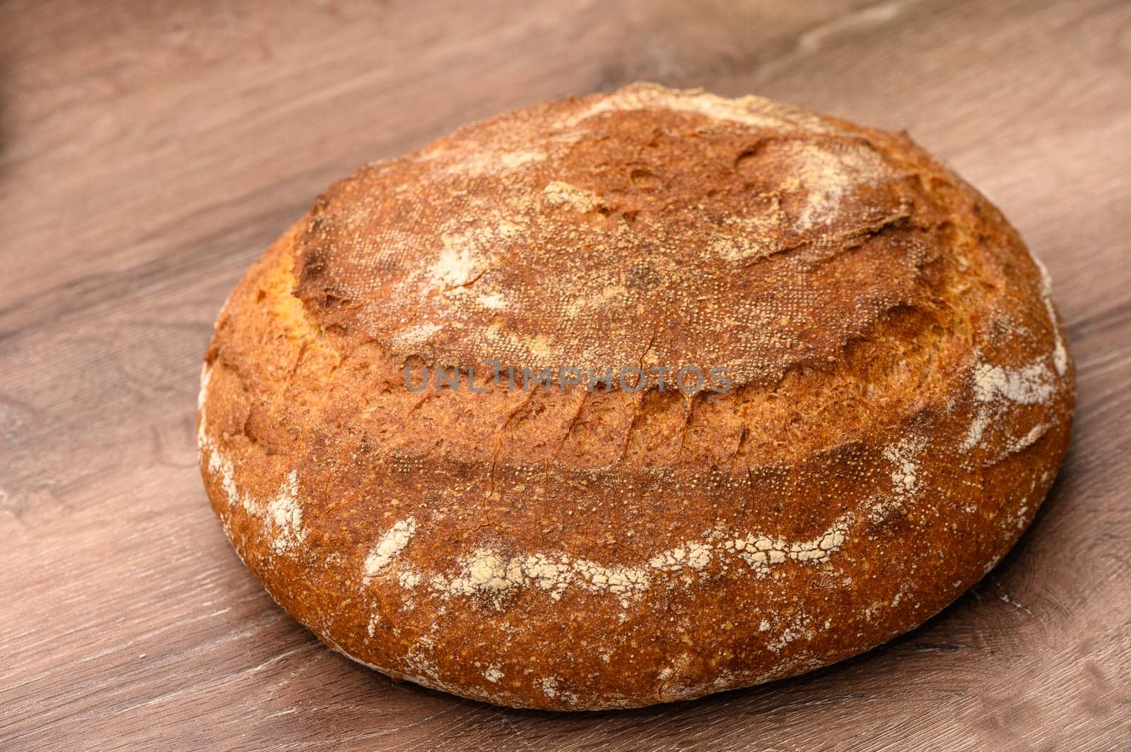 appetizing homemade whole grain bread on a wooden table 4