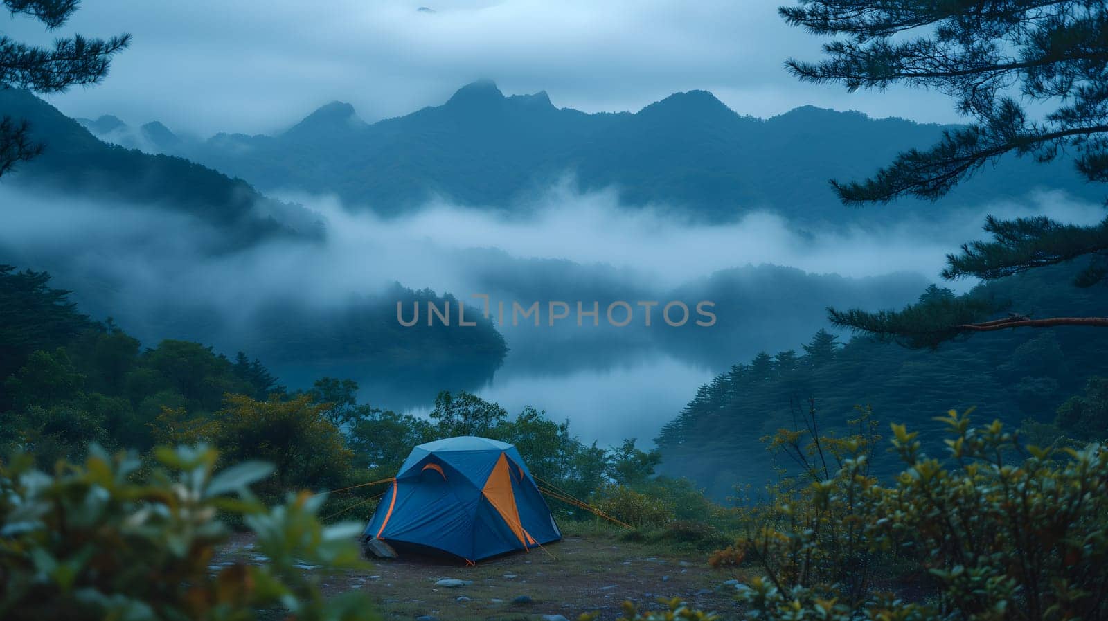 Close-up of a tent in the foreground and mountains with fog in the background with a lake or river in the foreground. Neural network generated image. Not based on any actual scene or pattern.