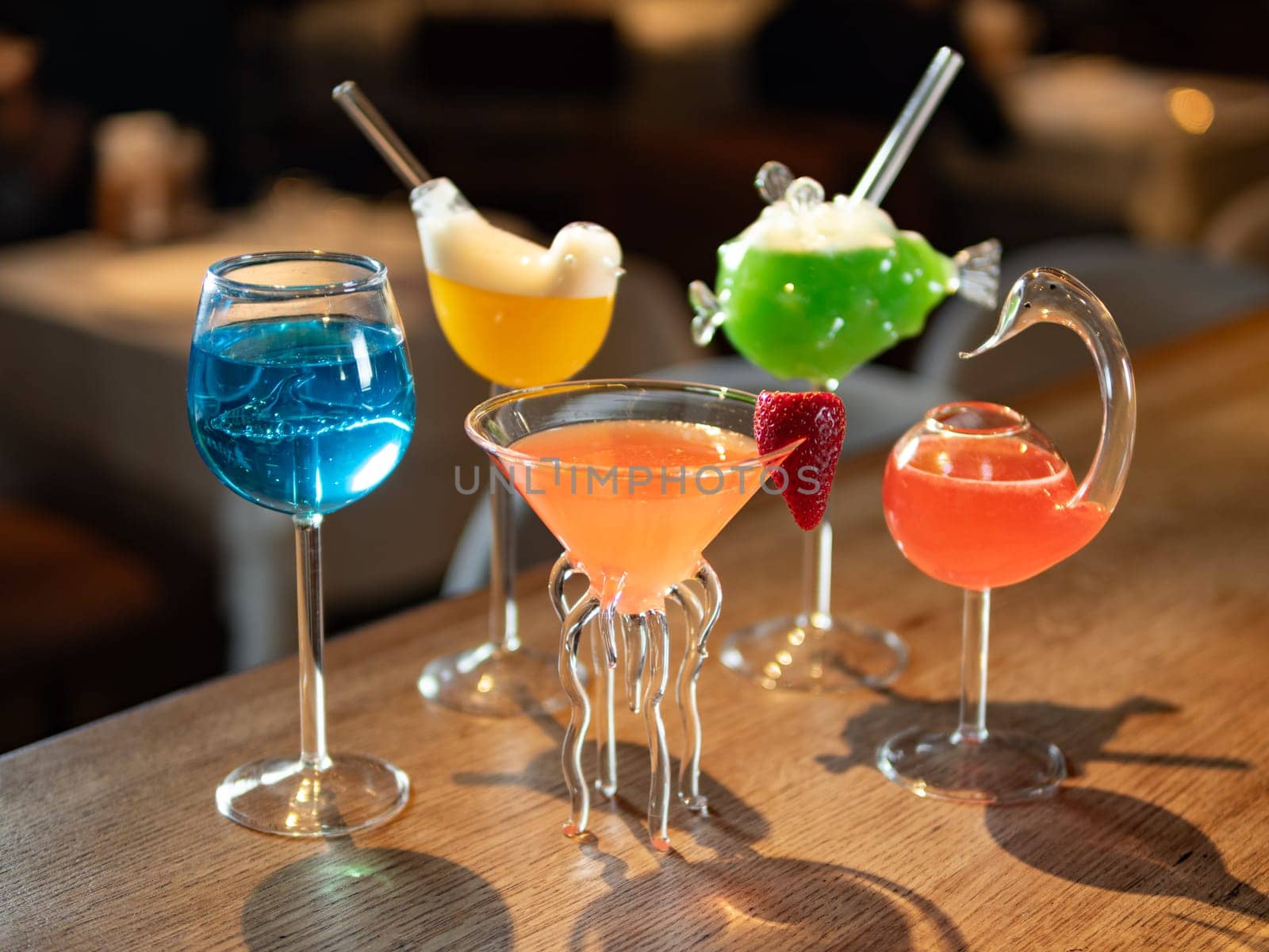 Set of different colorful alcoholic cocktails by fascinadora