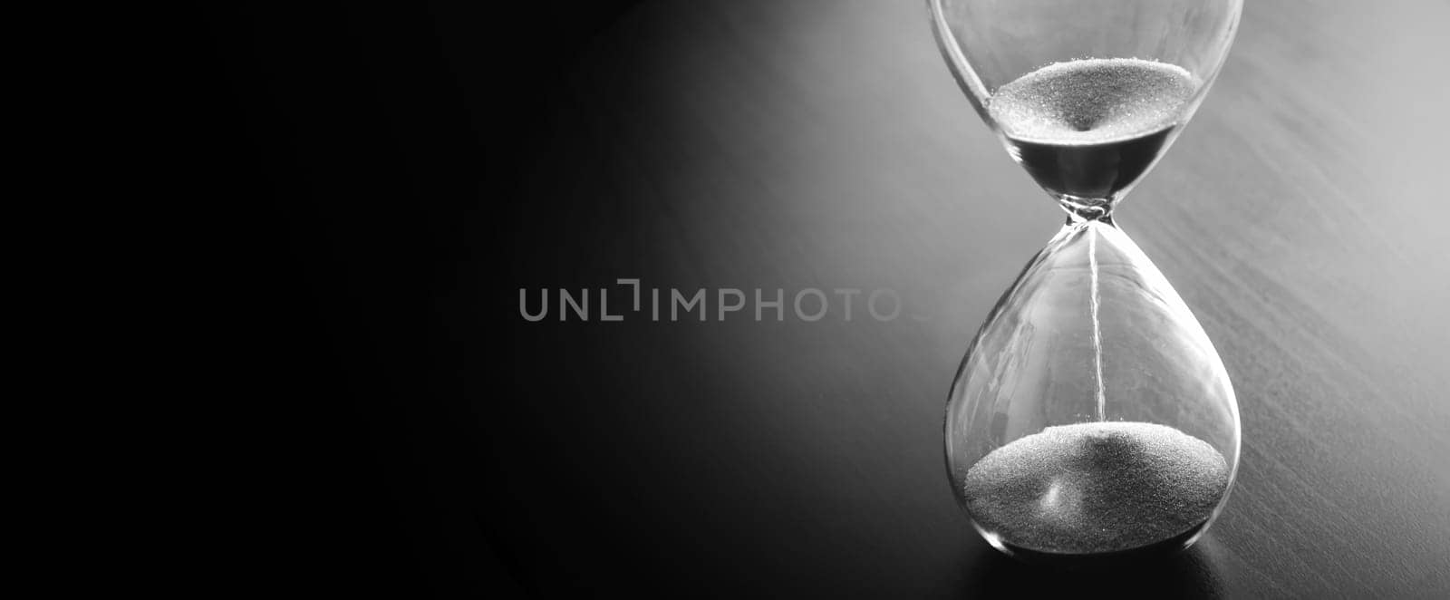 Time past concept with hourglass by simpson33