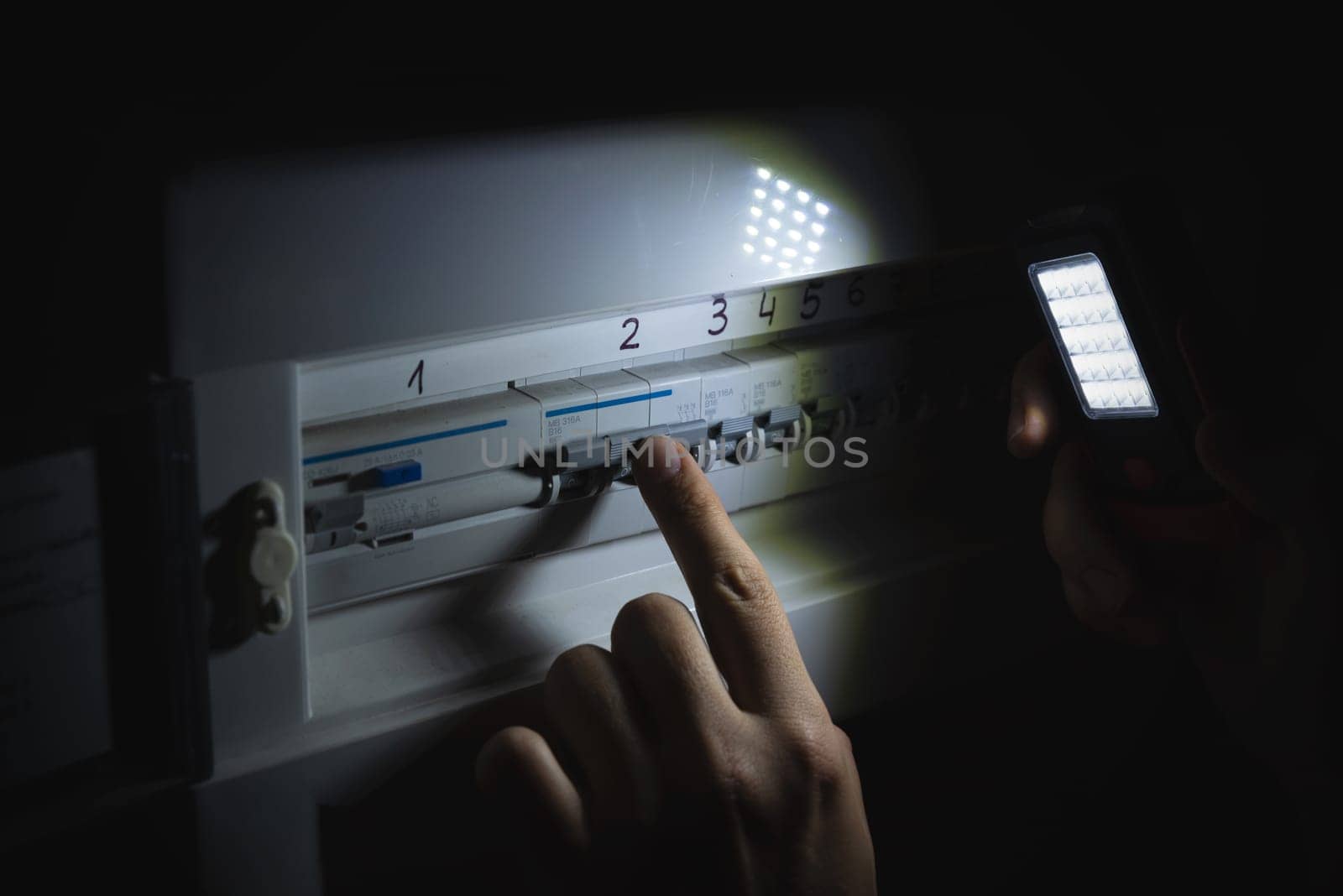 Investigate a home fuse box during a power outage by simpson33