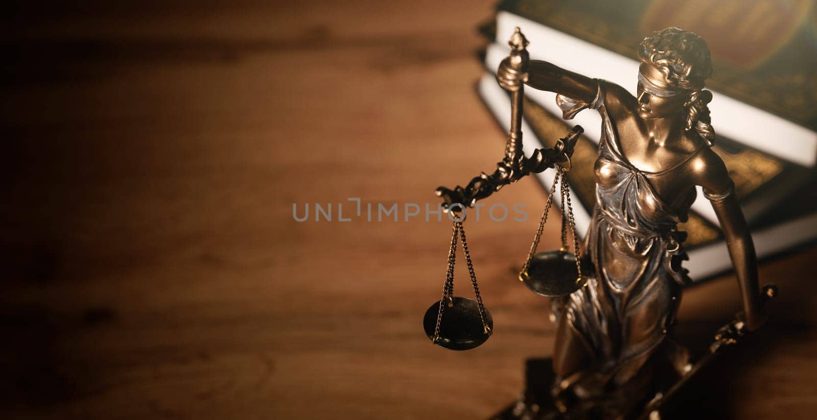 Justice and legal book on wooden table by simpson33