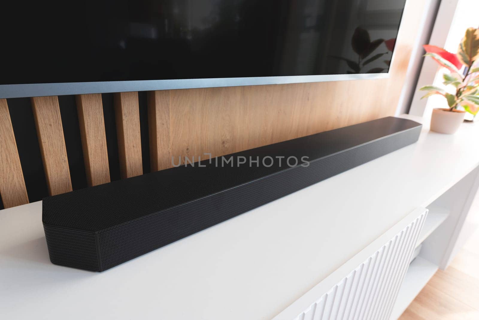 Soundbar in a modern home. Listening to music by simpson33