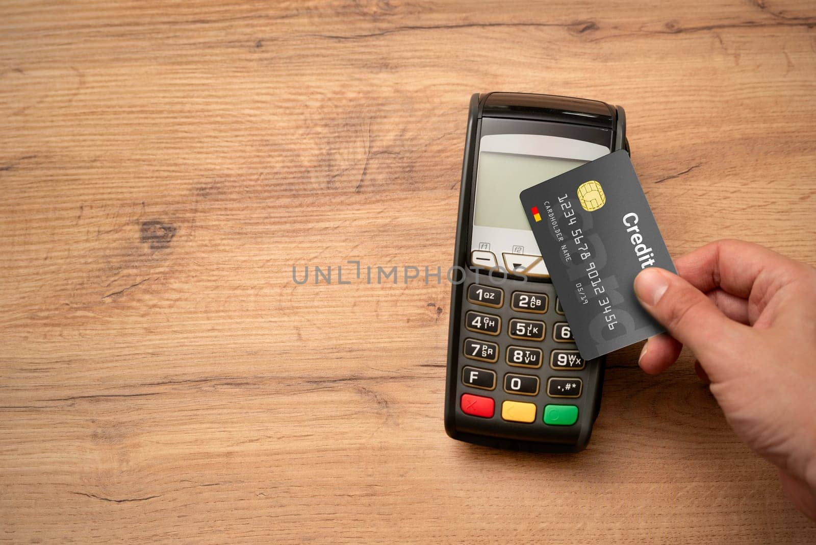 Pos terminal with credit card. Card payment method, top view