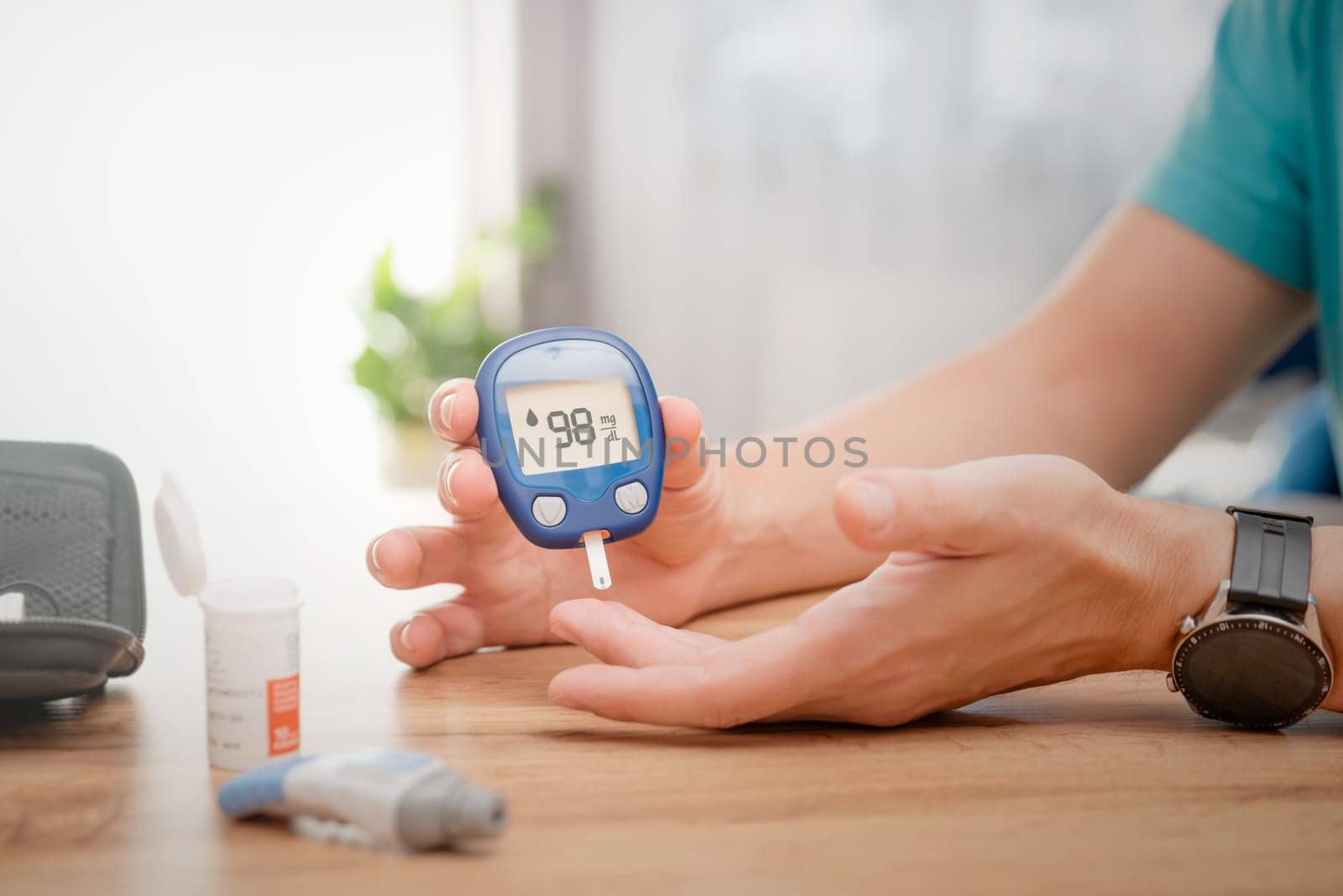 Diabetes doing sugar blood test, using glucometer