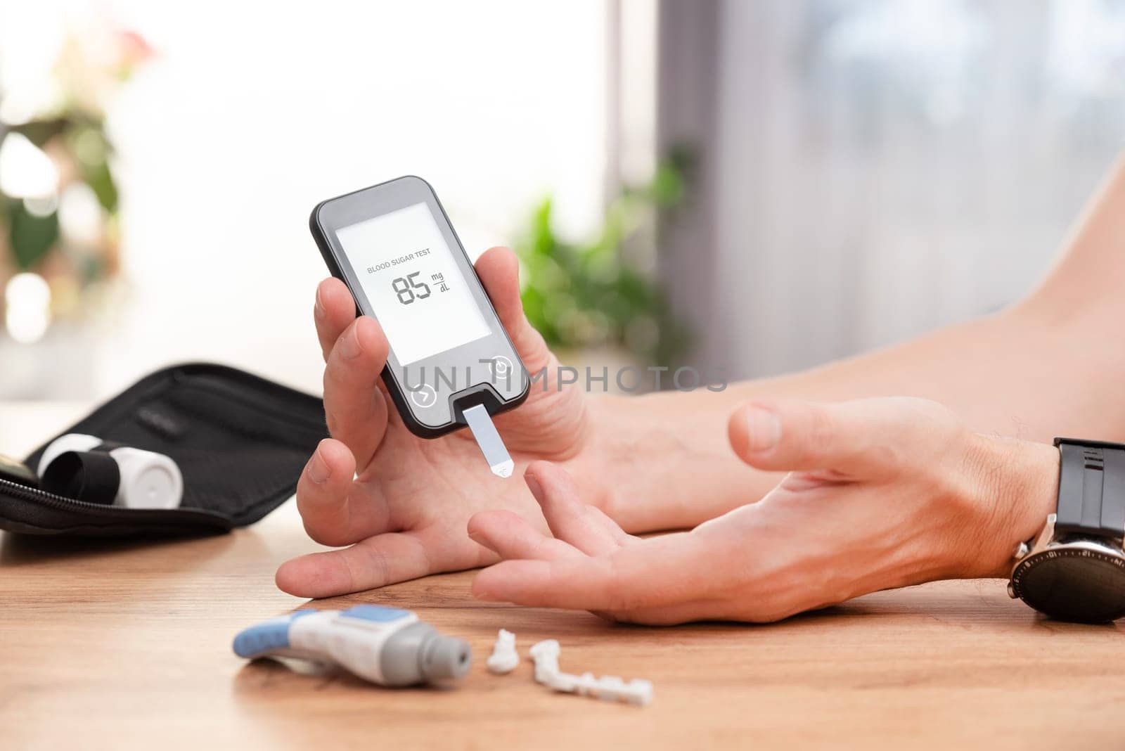 Diabetes doing sugar blood test, using glucometer