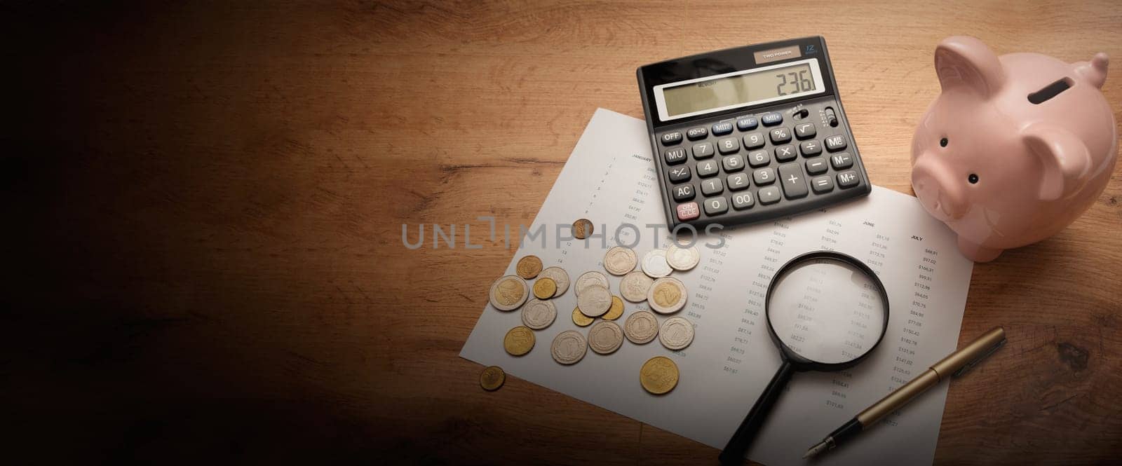 Business and finance concept with piggy bank and calculator