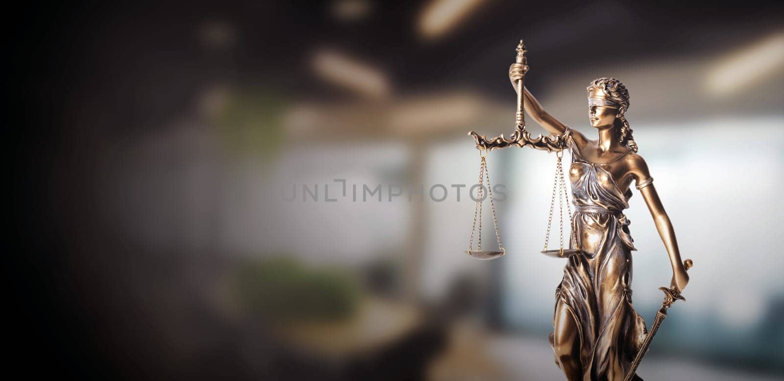 Blind justice symbol on a metallic statue. Law and justice concept, copy space