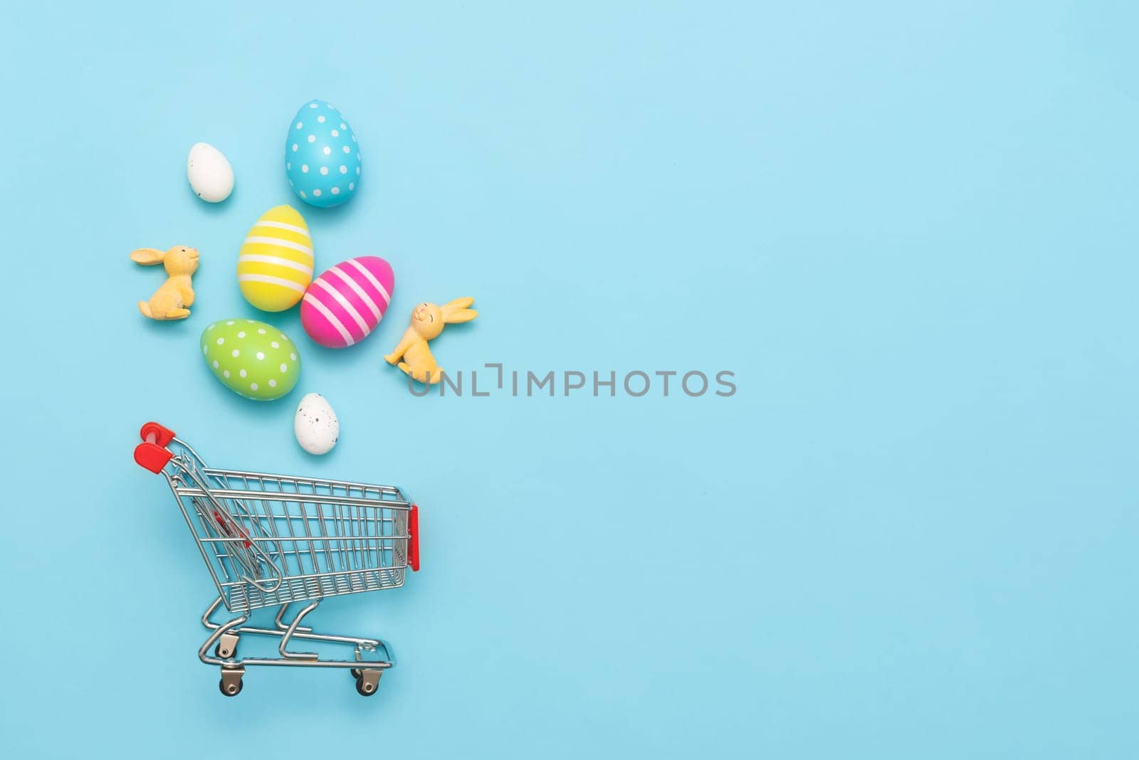 Easter sale concept with eggs and bunnies top view