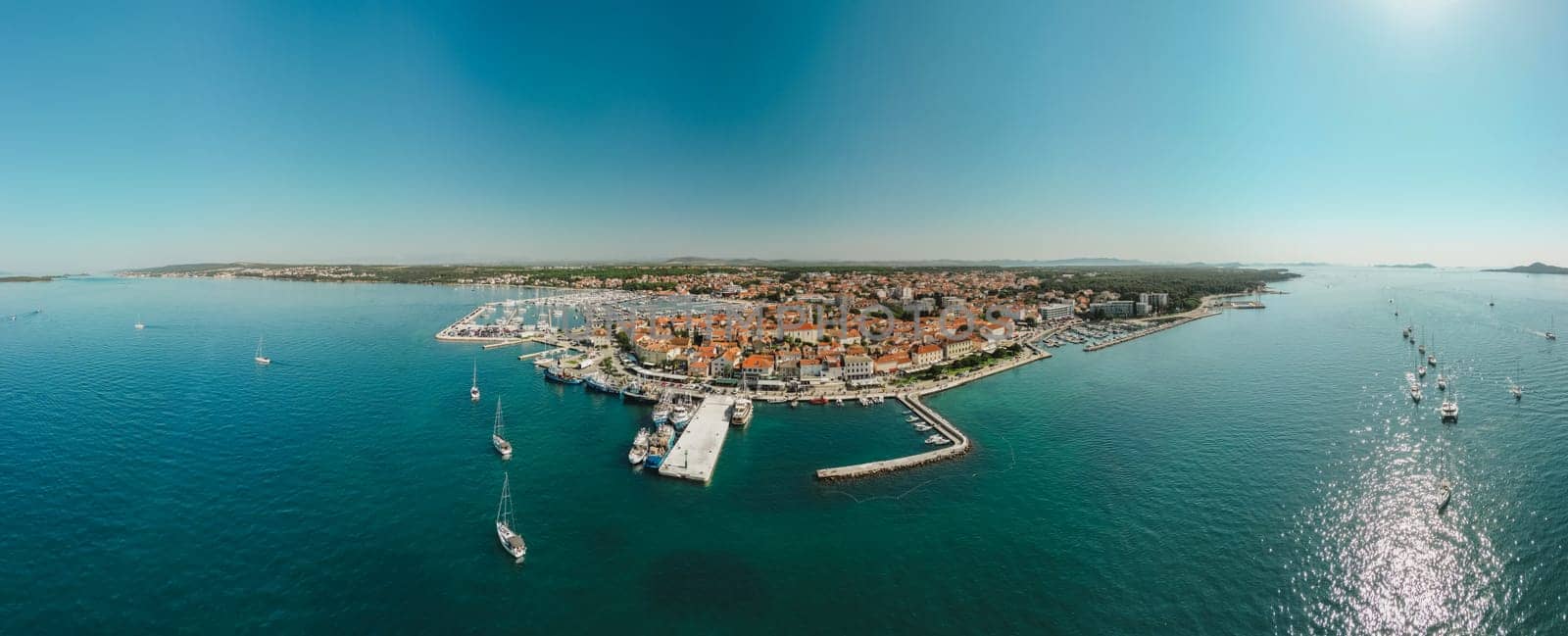 Biograd na Moru, aerial panoramic view of marina and beautiful Old Town architecture. Panorama with port and boats, summer cityscape and blue waters of Adriatic Sea, Dalmatia region of Croatia