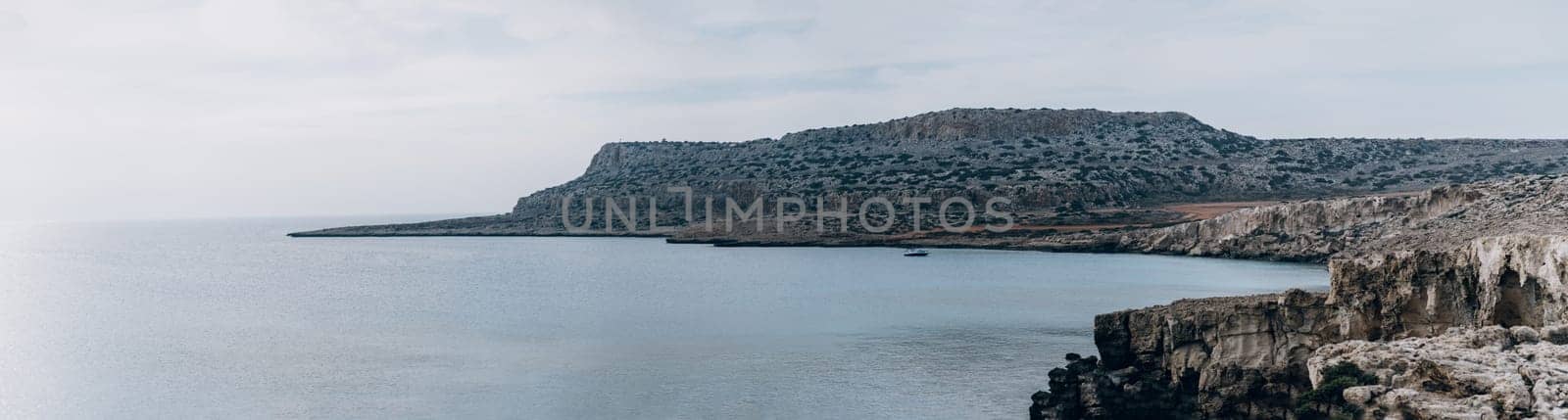 Panoramic landscape of rocky seashore of Cape Greco, Cyprus by Popov