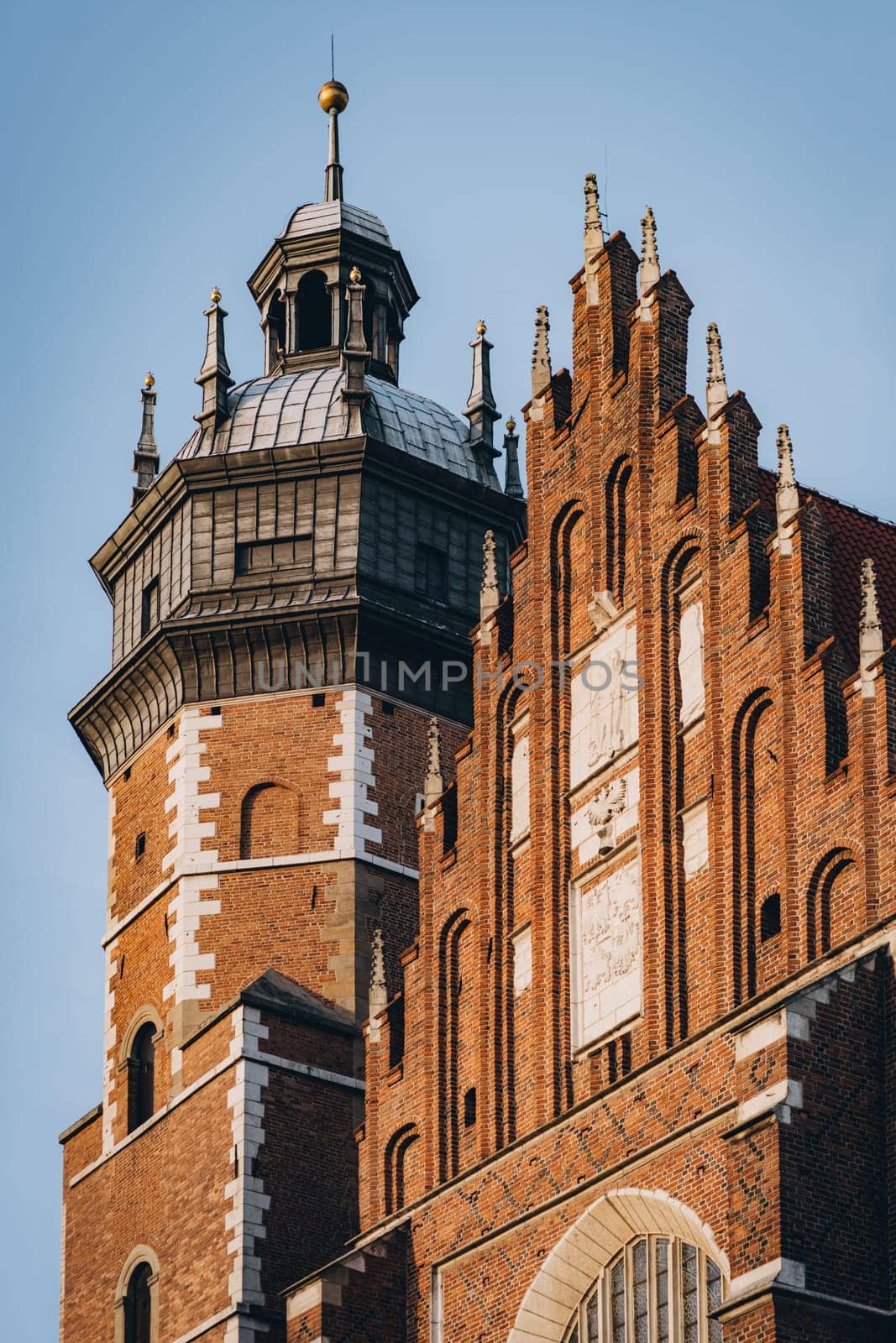 Gothic building facade of Corpus Christi Basilica in Krakow, Poland by Popov