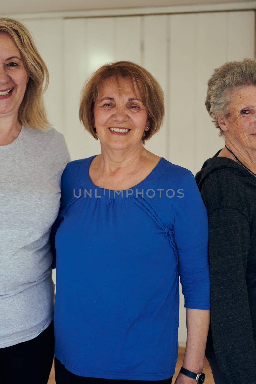 A vibrant community of senior women, guided by their instructor, embraces the enriching journey of yoga, fostering unity, well-being, and a shared commitment to active aging by dotshock