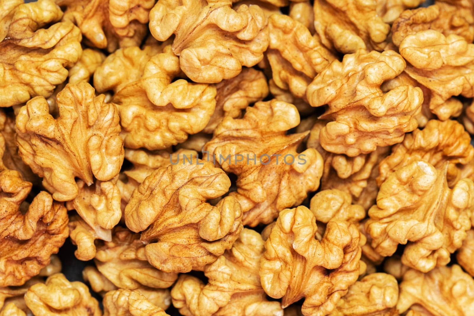 Walnuts background. Kernels walnuts. Top view. Vegetarian or healthy food.